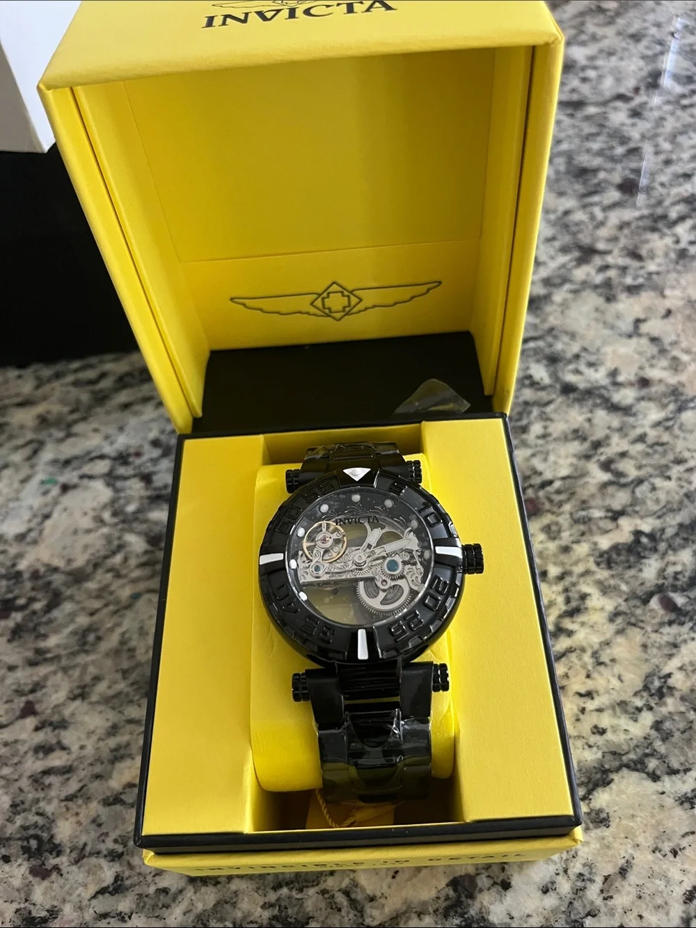 Invicta Black Skeleton Dial Men's Bracelet Watch with Silver Movement Accents